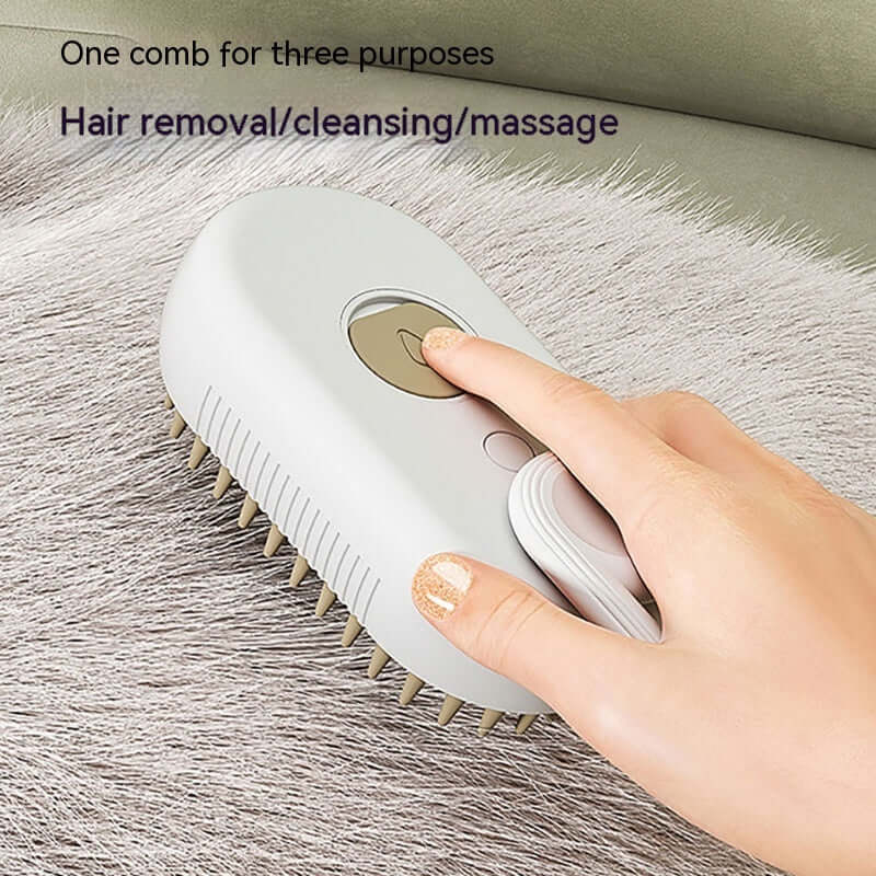 Brosse vapeur électrique pour animaux avec bouton et picots, idéale pour le toilettage et le retrait des poils.